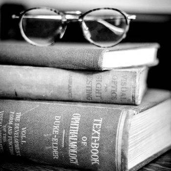 Glasses on books